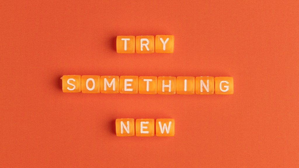 تصویری که روی آن نوشته شده Try something new به معنای یه چیز جدید رو تست کن